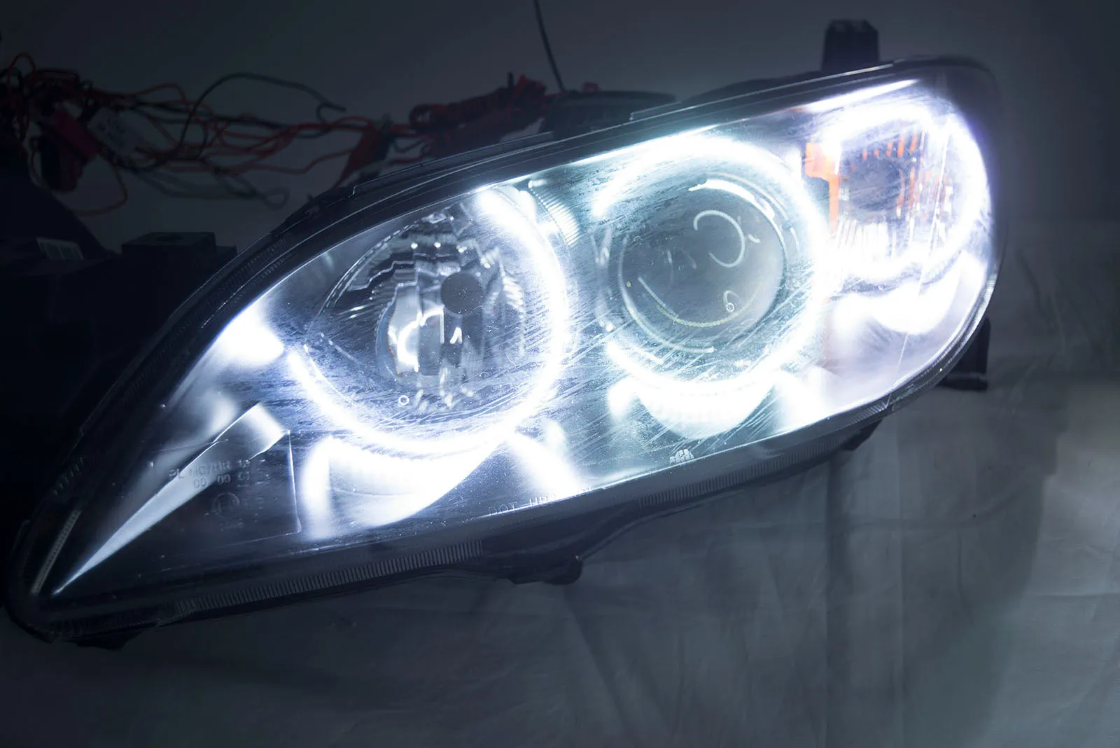 2004-2009 Mazda 3 4 Door Projector Headlights - ORACLE WHITE LED Halos